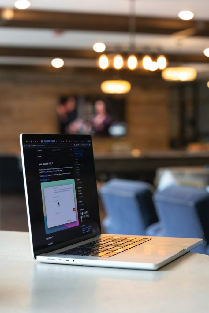 laptop-on-a-desk-in-a-modern-well-lit-interior-wvluwsrgtty